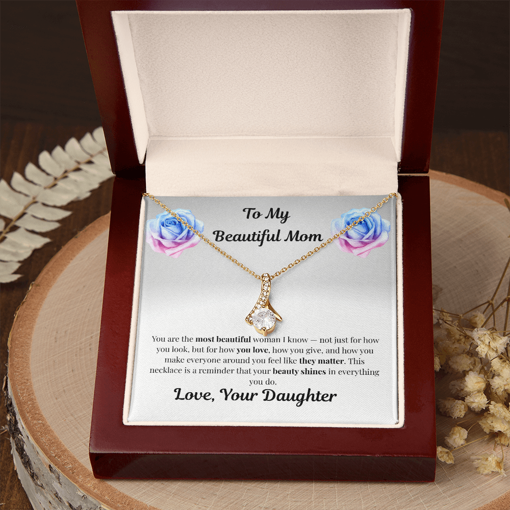 18K yellow gold-finish Alluring Beauty Necklace in mahogany gift box on wooden tray
