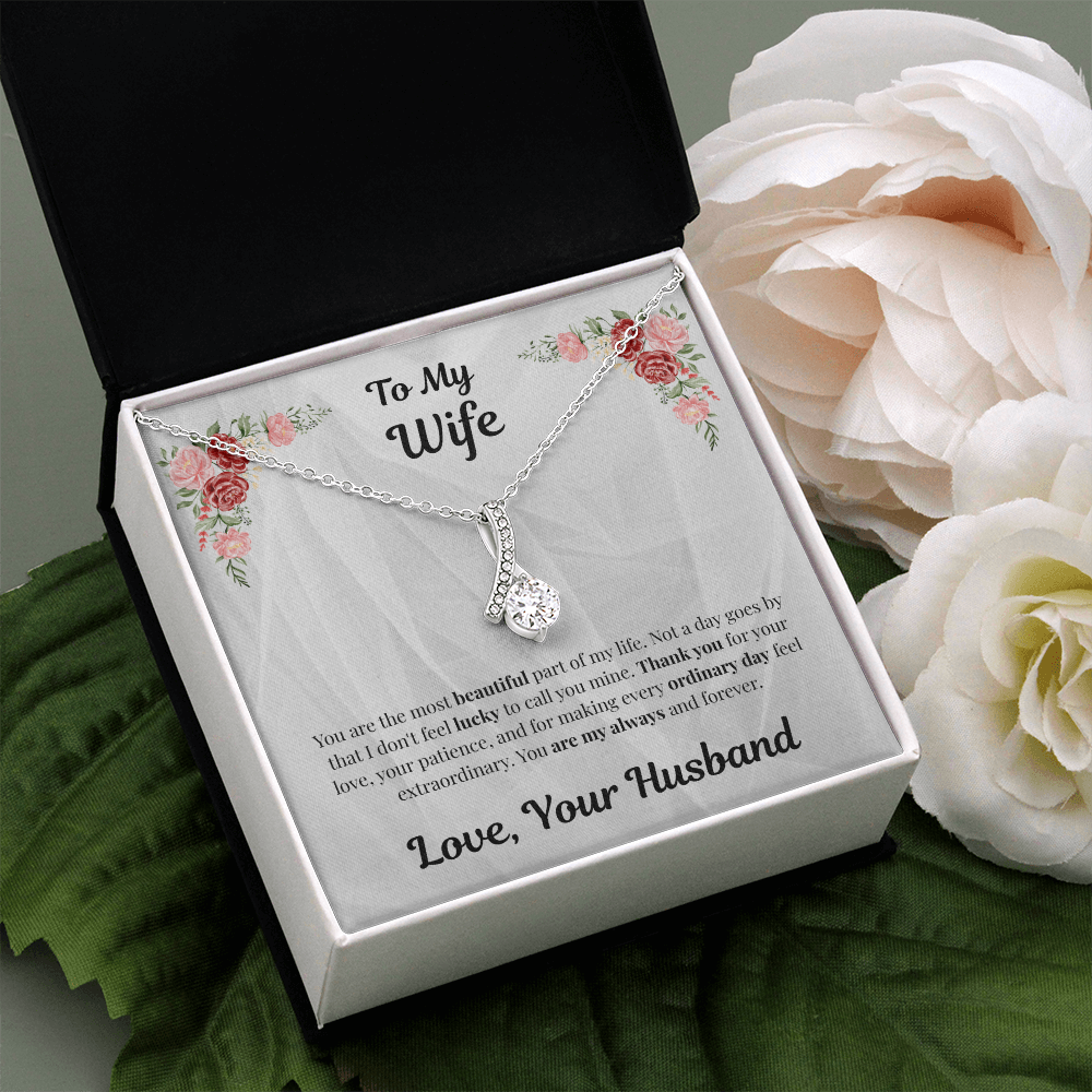 14k white gold-finish Alluring Beauty Necklace in standard gift box with white flowers