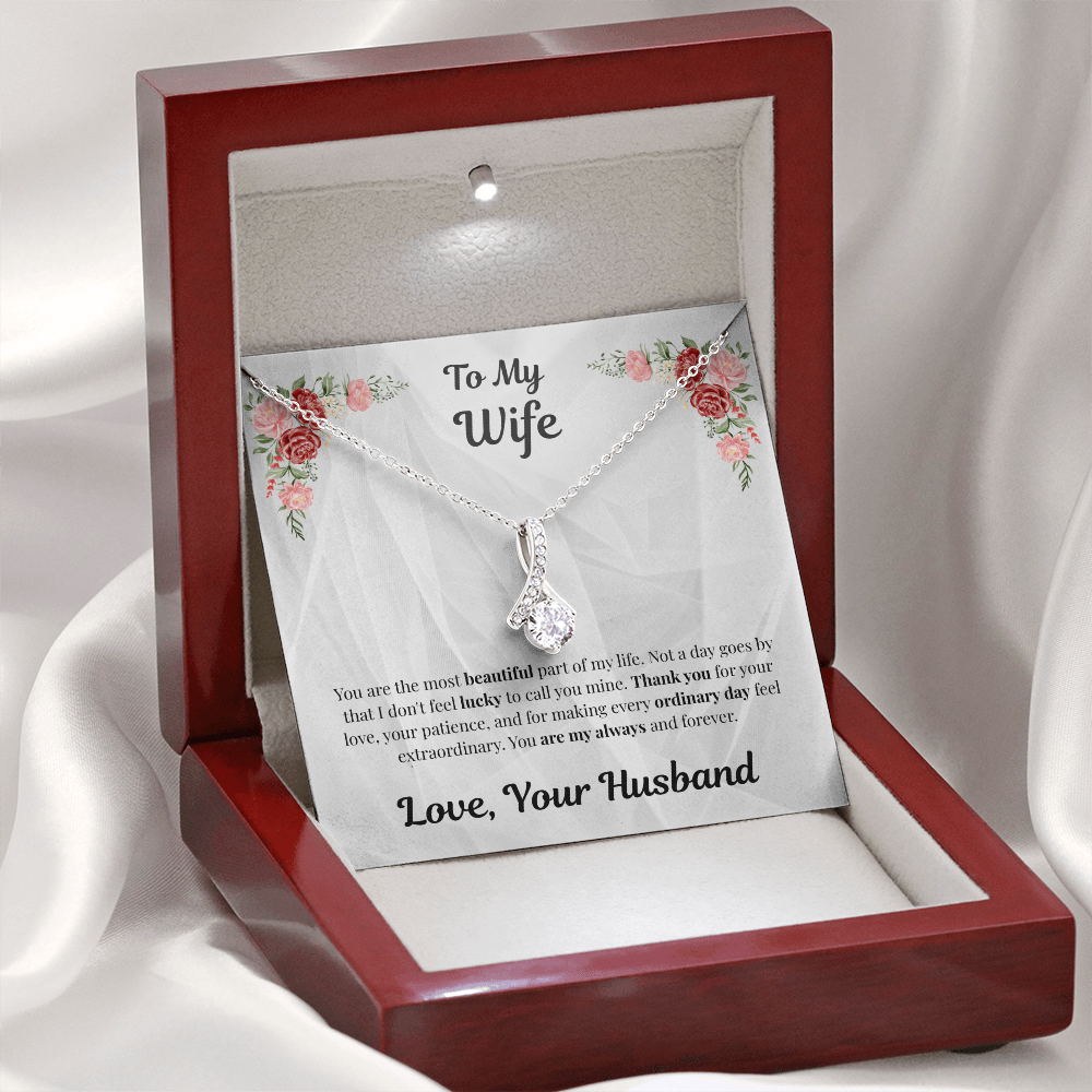 14k white gold-finish Alluring Beauty Necklace in illuminated mahogany gift box on white fabric