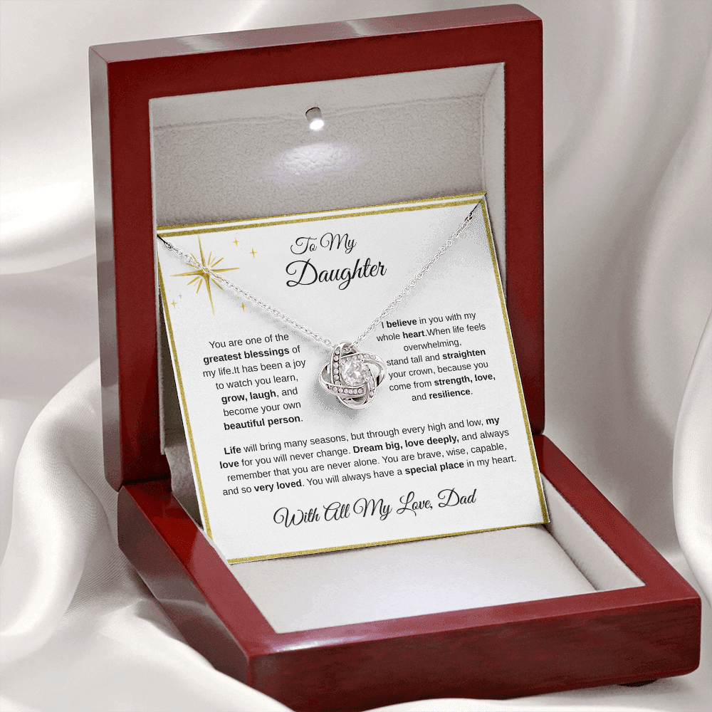 14K white gold-finish Love Knot Necklace in illuminated mahogany gift box on white fabric