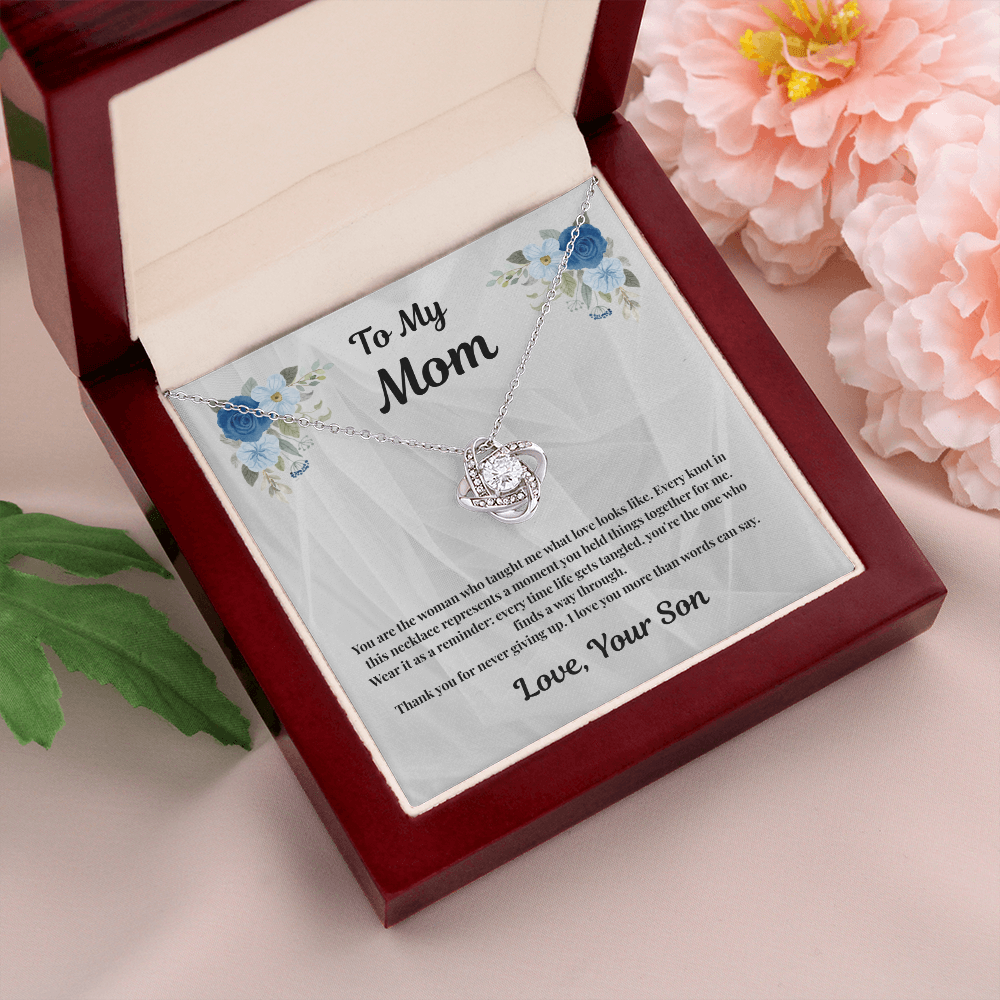 14K white gold-finish Love Knot Necklace in mahogany gift box with pink flowers