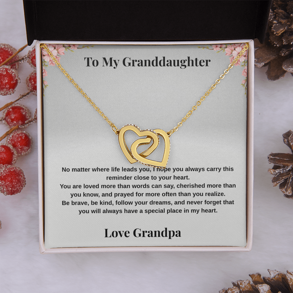 18k yellow gold-finish Interlocking Hearts Necklace on To My Granddaughter message card from Grandpa with winter holiday decorations