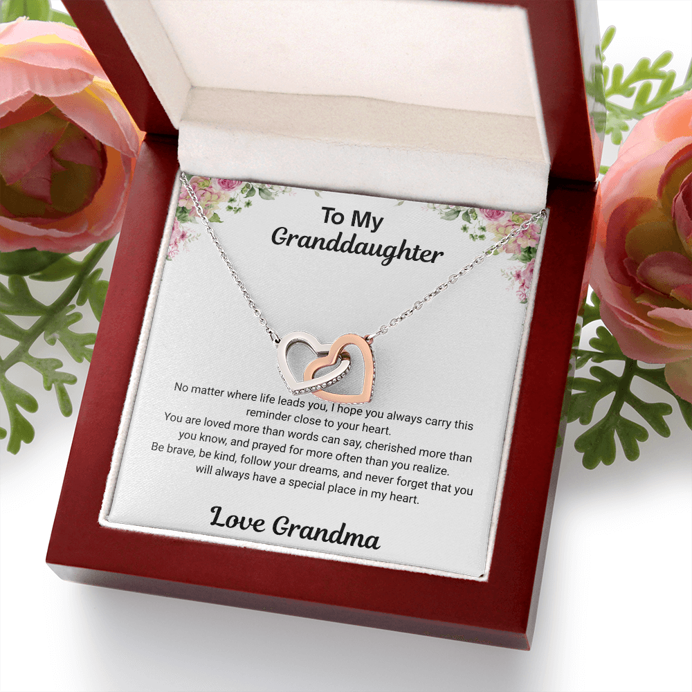 14k white gold-finish Interlocking Hearts Necklace in open mahogany-style luxury box with To My Granddaughter message card from Grandma and pink flowers
