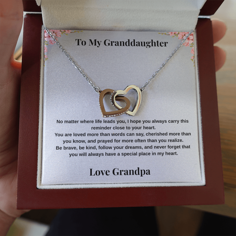 Close-up of 14k white gold-finish Interlocking Hearts Necklace in mahogany-style luxury box with To My Granddaughter message card from Grandpa