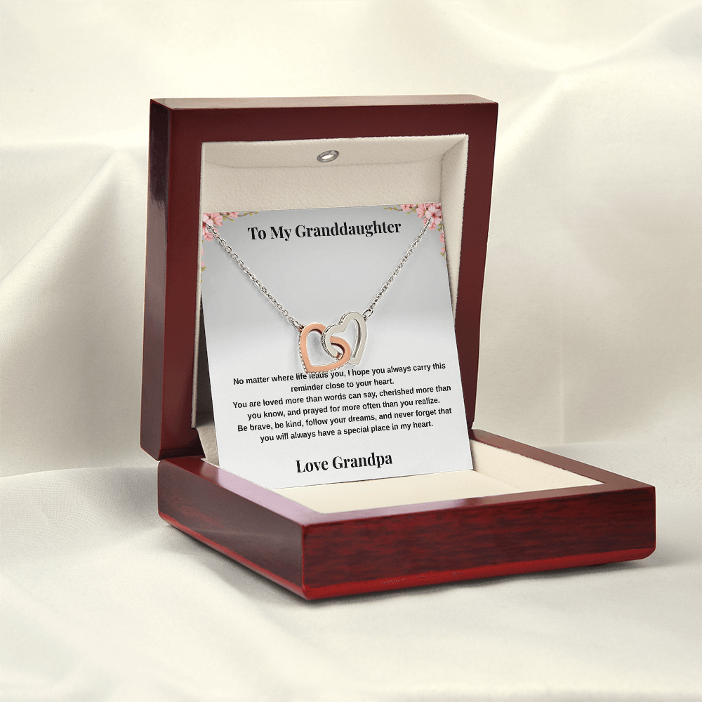 14k white gold-finish Interlocking Hearts Necklace in open mahogany-style luxury box on satin background with To My Granddaughter message card from Grandpa