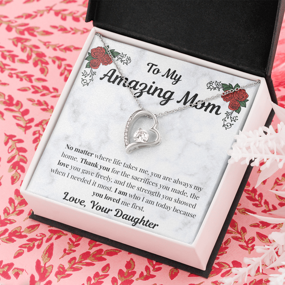 14k white gold-finish Forever Love Necklace in standard gift box on pink floral background